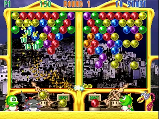 Backdrop artwork for Super Puzzle Bobble