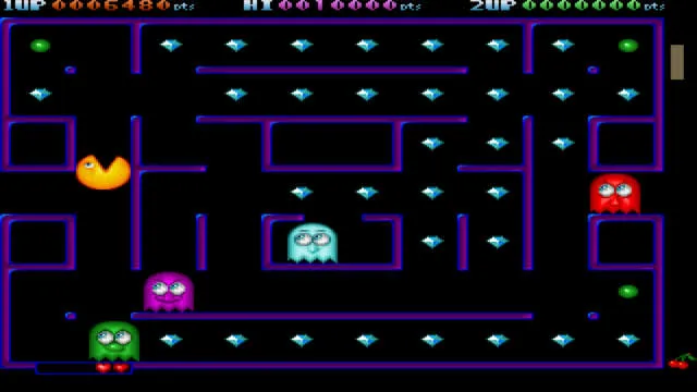 Backdrop artwork for Deluxe Pac-Man