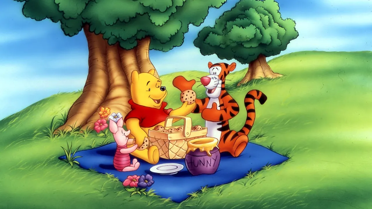 Backdrop artwork for Winnie the Pooh's Rumbly Tumbly Adventure